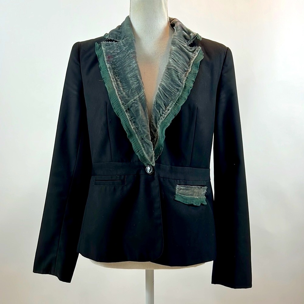Vintage woman’s black blazer with crushed velvet lapel.